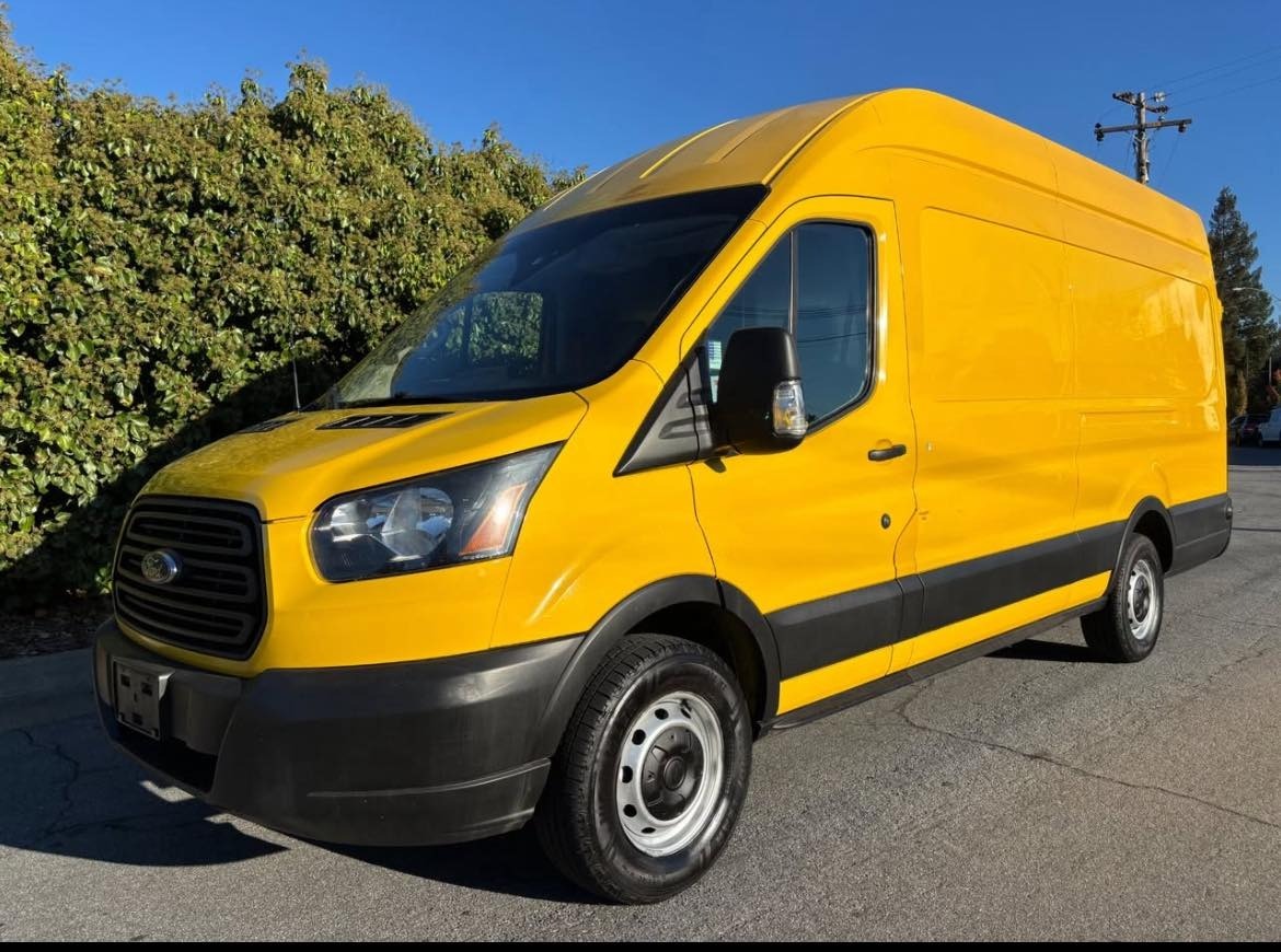 The actual Soul Medicine Mobile yellow Ford Transit van